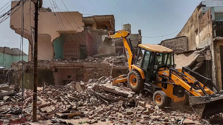 kanpur-a-bulldozer-being-used-to-demolish-illegal-houses-to-clear-the-land-for-